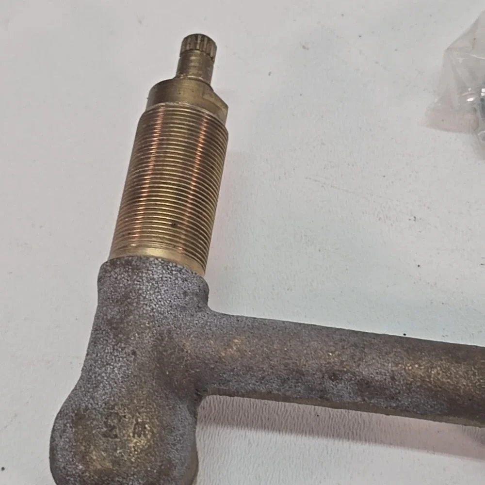 The American Brass Manufacturing Co. Brass 2-valve Tub Filler Threaded Escutcheo